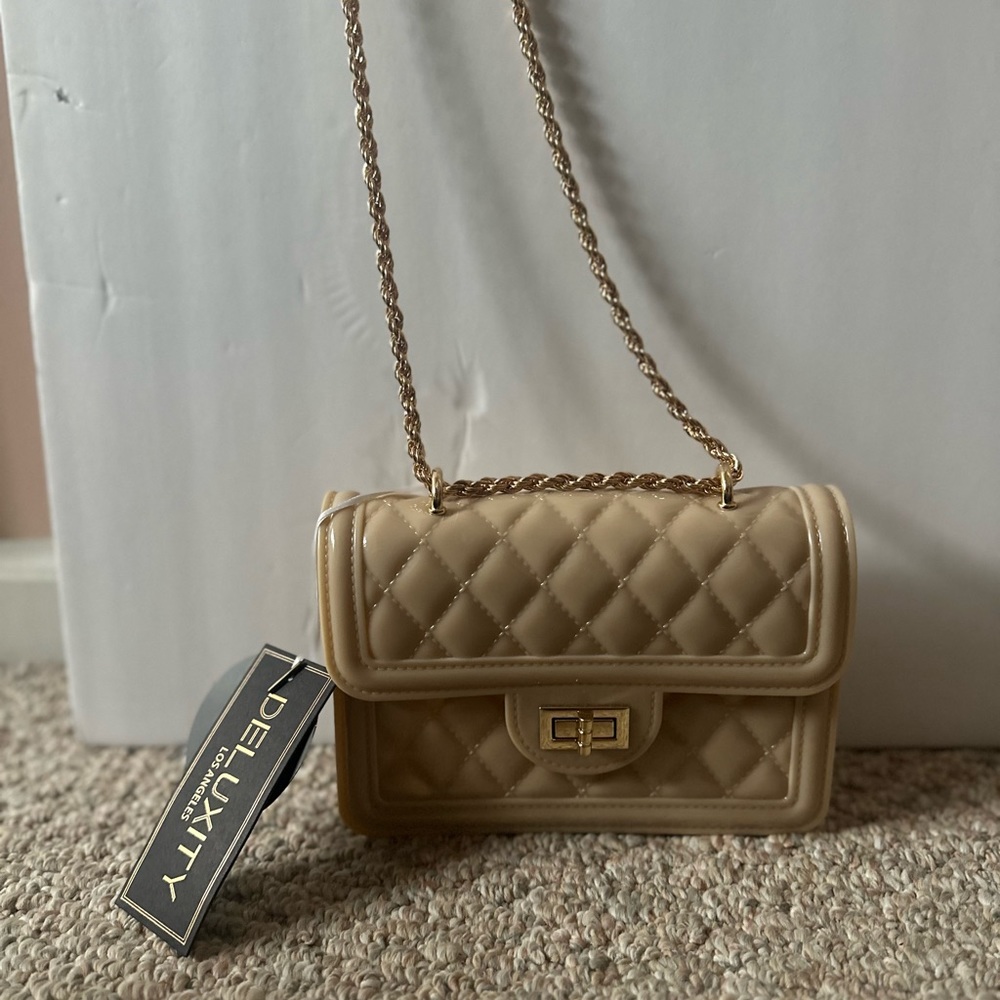 Nude jelly medium size crossbody purse with gold chain strap with gold hardware